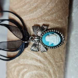 NEW! Angel cherub cameo on ribbon necklace. HANDMADE!